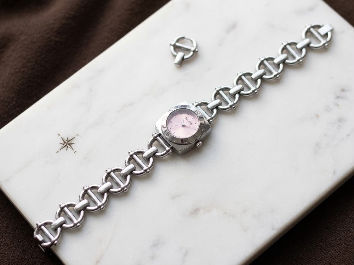 Silver with pink dail